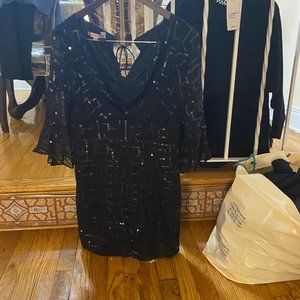 Short black cocktail dress with sequence